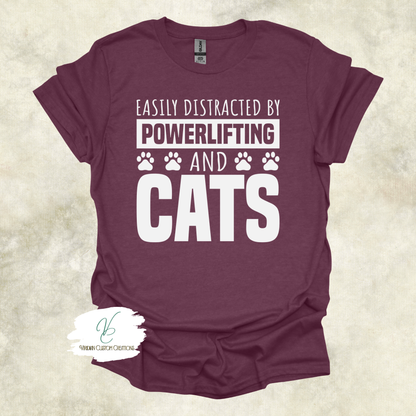 Easily Distracted by Powerlifting and Cats Tee – Funny Shirt for Cat Lovers & Lifters